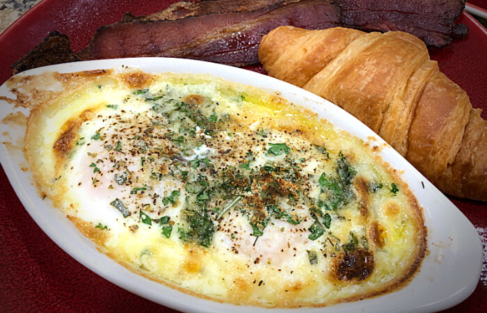 Herbed Baked Eggs with a croissant