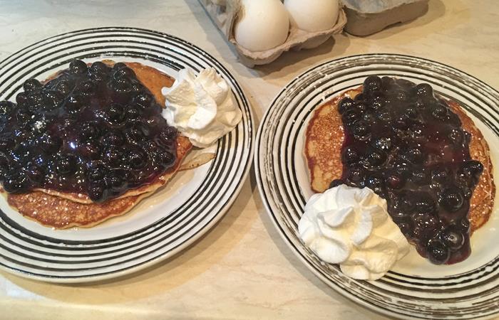 Pancakes with blueberry sauce