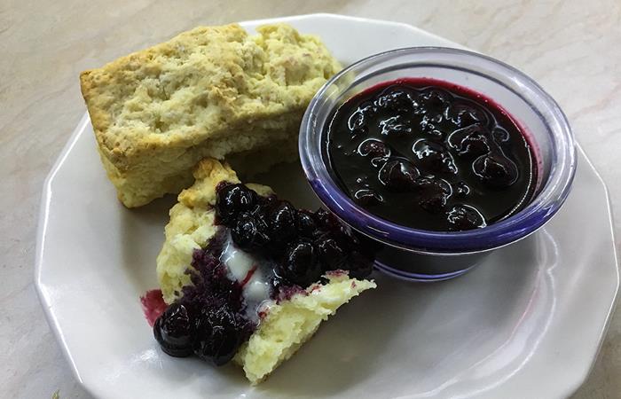 homemade biscuits with blueberry sauce
