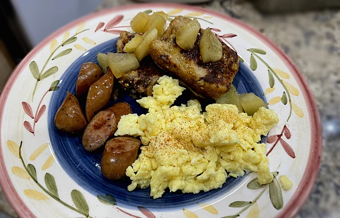 French Toast with stewed apples, Scrambled Eggs, and Sliced  kielbasa
