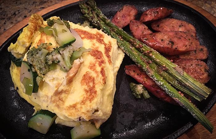 Omelette with smoked sausage and asparagus
