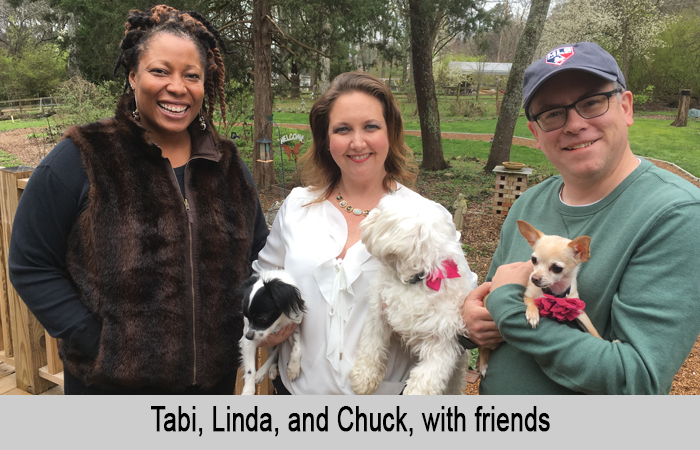 Tabi, Linda, and Chuck with friends.