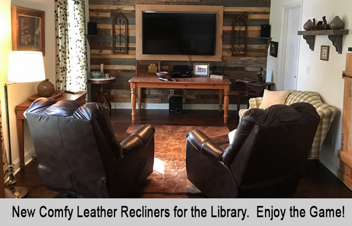 New comfy leather recliners for the Library.  Enjoy the game!